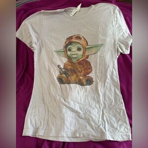 Grogu dressed as Chewbacca with Han Solo toy- Star Wars